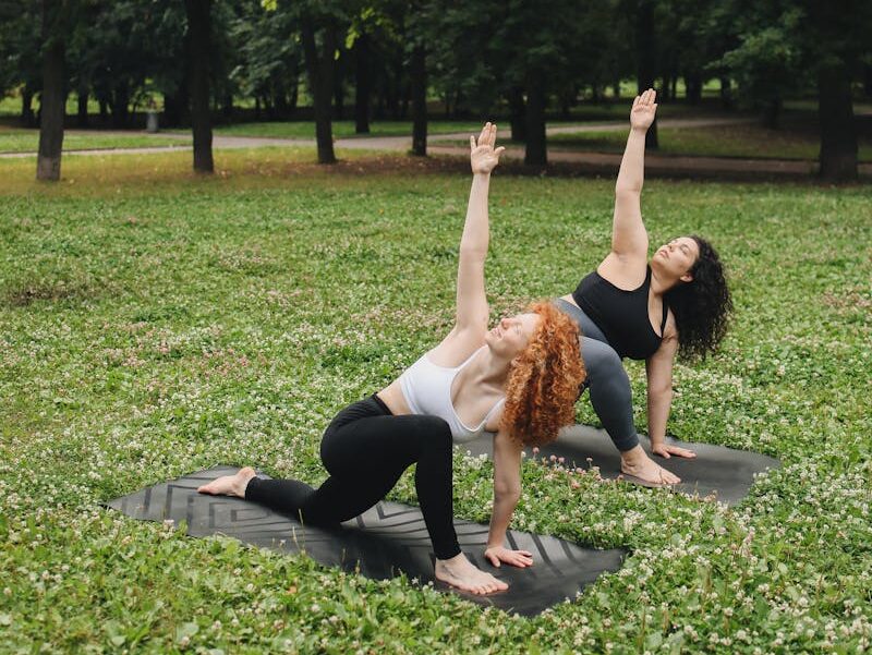 two women doing exercise